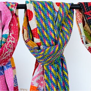 long patchwork scarf, colorful fun accessory, hippie boho style, features bright geometric patterns, casual every day scarf, made in india, made by artisans, soft cotton material, end strings, warm winter wrap, kantha fabric