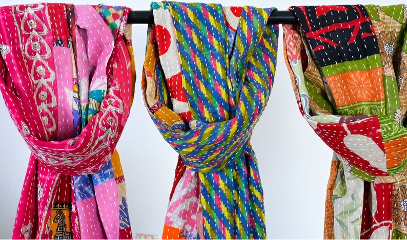 long patchwork scarf, colorful fun accessory, hippie boho style, features bright geometric patterns, casual every day scarf, made in india, made by artisans, soft cotton material, end strings, warm winter wrap, kantha fabric