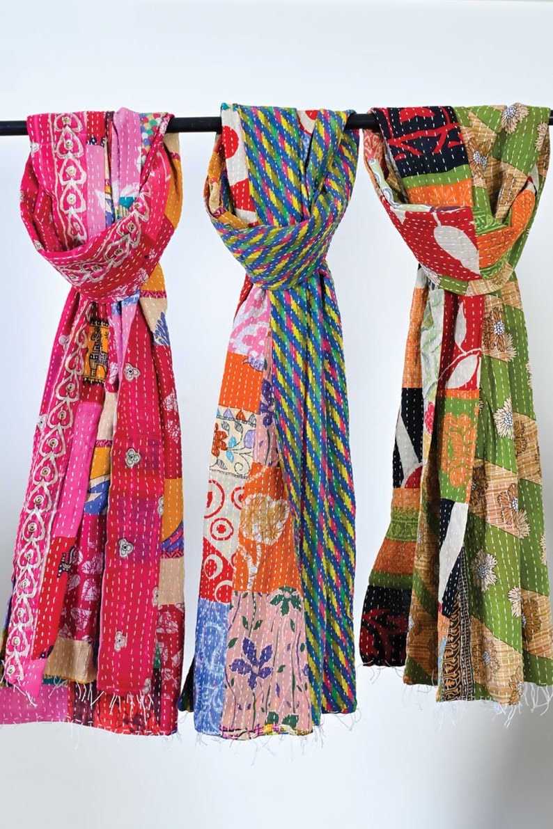 long patchwork scarf, colorful fun accessory, hippie boho style, features bright geometric patterns, casual every day scarf, made in india, made by artisans, soft cotton material, end strings, warm winter wrap, kantha fabric