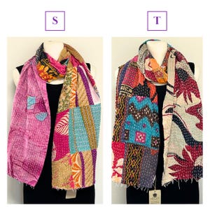 K&ouml;nnte beinhalten: Zwei farbenfrohe Patchwork-Schals, die auf Schaufensterpuppen pr&auml;sentiert werden. Der Schal links ist haupts&auml;chlich rosa mit einem Patchwork-Design, w&auml;hrend der Schal rechts eine Mischung aus Mustern und Farben aufweist. Beide Schals sind drapiert, um ihr Design zu pr&auml;sentieren.