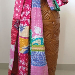 long patchwork scarf, colorful fun accessory, hippie boho style, features bright geometric patterns, casual every day scarf, made in india, made by artisans, soft cotton material, end strings, warm winter wrap, kantha fabric