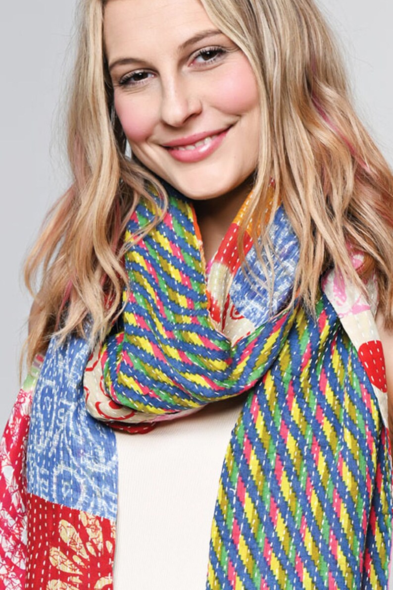 long patchwork scarf, colorful fun accessory, hippie boho style, features bright geometric patterns, casual every day scarf, made in india, made by artisans, soft cotton material, end strings, warm winter wrap, kantha fabric