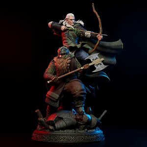 May include: A detailed figurine of two figures in combat. An archer with long white hair aims a bow. Below, a bearded warrior with an axe stands over a fallen foe. The figures are in detailed armour and clothing, set against a dark background.
