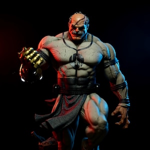 Op de afbeelding: Gespierde actiefiguur met een strenge uitdrukking, een zwarte riem en een donkergrijze rok. De figuur heeft een gouden handschoen aan één hand, tegen een zwarte en rode achtergrond.