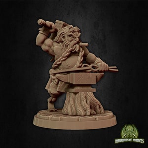 May include: A miniature figurine of a dwarf blacksmith, holding a hammer and tongs, standing next to an anvil on a wooden base. The dwarf is wearing a leather apron and has a beard and mustache.