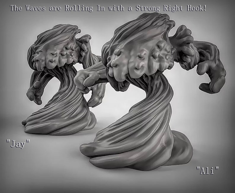 May include: Two gray, abstract, 3D printed sculptures of waves crashing. The sculptures are titled "Jay" and "Ali".