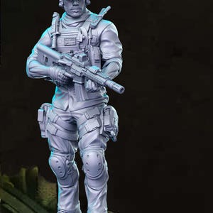 May include: A gray figurine of a soldier in tactical gear, holding a rifle. The figure wears a helmet with a Union Jack, a tactical vest, and knee pads. The figure is standing on a blue platform. The overall theme is military.