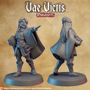 May include: A gray 3D printed miniature of a female figure wearing a long robe and holding a book. The figure is standing on a round base. The miniature is part of a set of miniatures called "Vae Victis Miniatures".