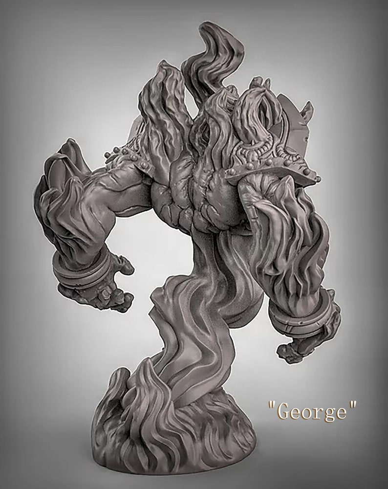 May include: A gray, sculpted figurine of a creature made of flames. The creature has a humanoid form with a large head and arms. The figurine is standing on a base of flames. The text "George" is written below the figurine.