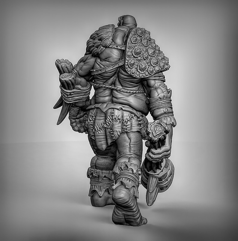 May include: A gray, detailed miniature figurine of a large, muscular, humanoid creature with a club in one hand and a shield on its back. The creature is wearing a loincloth and has a fierce expression.
