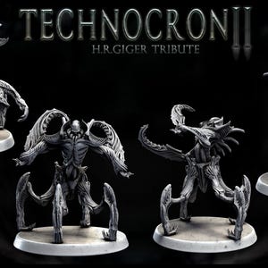 May include: Four detailed, gray, articulated, skeletal figures with wings and claws, standing on circular bases. The figures are part of a set called "Technocron II H.R. Giger Tribute".