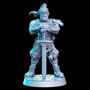 May include: A gray miniature figurine of a warrior with a long beard and a sword. The warrior is wearing armor and a long robe. The figurine is standing on a round base.