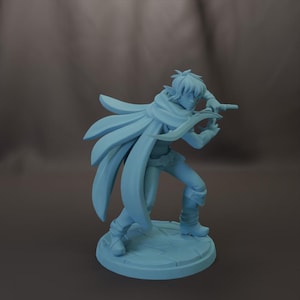 May include: A light blue figurine of a fantasy character in a dynamic pose, holding a weapon. The figure is wearing a cape and boots, standing on a circular base with a textured surface. The overall design suggests a miniature for tabletop gaming.