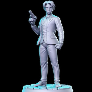 May include: A white figurine of a man in a suit holding a gun. The figurine is standing on a circular base with a textured surface.