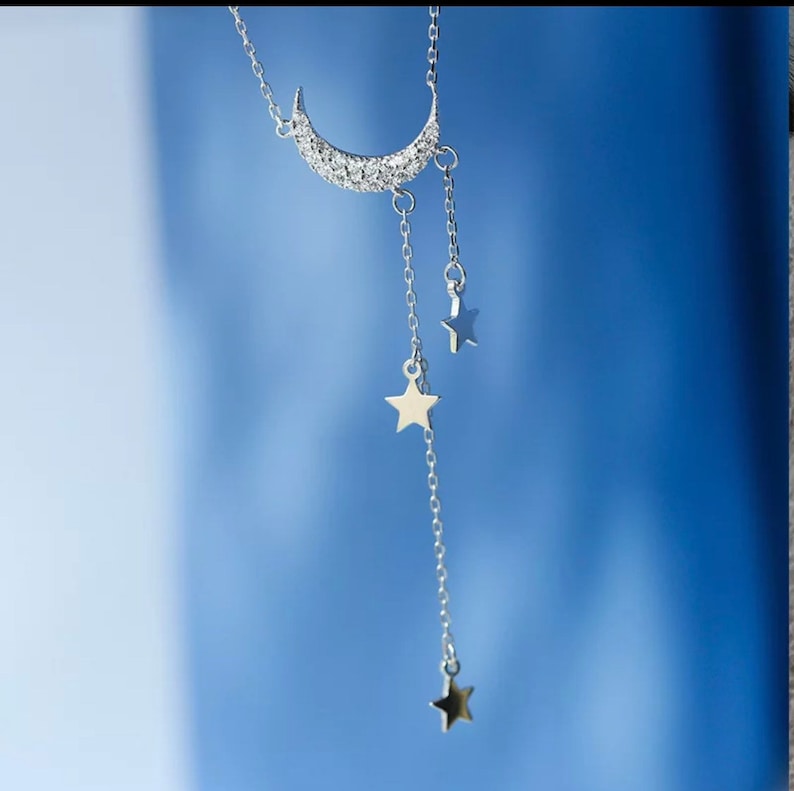 Charming magical silver star and moon necklace