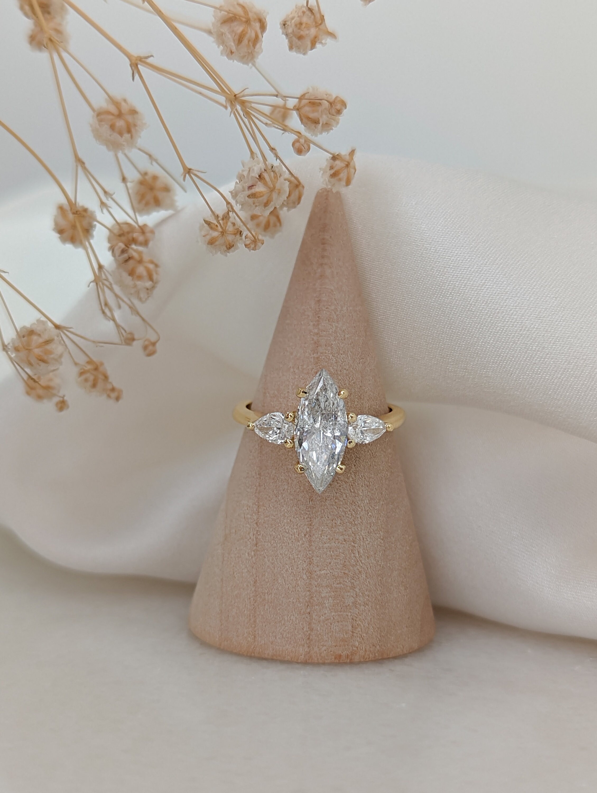 Gold band marquise best sale diamond