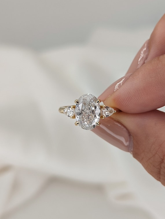 Oval engagement rings with cheap 2 side stones