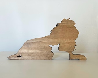 Handmade wooden lion and lamb