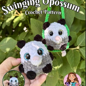 May include: Two plush opossum toys made of soft yarn, one held in a hand and one hanging from a green loop. The opossums have white faces, grey bodies, black ears, and large glittery eyes. Text reads: Swinging Opossum Crochet Pattern and Low Sew!