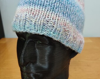 Hand knitted handmade pastel colourful beanie hat made from acrylic yarn