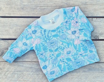 Spring flowers in blue tones jumper sweater, Jen's Corner Shop.