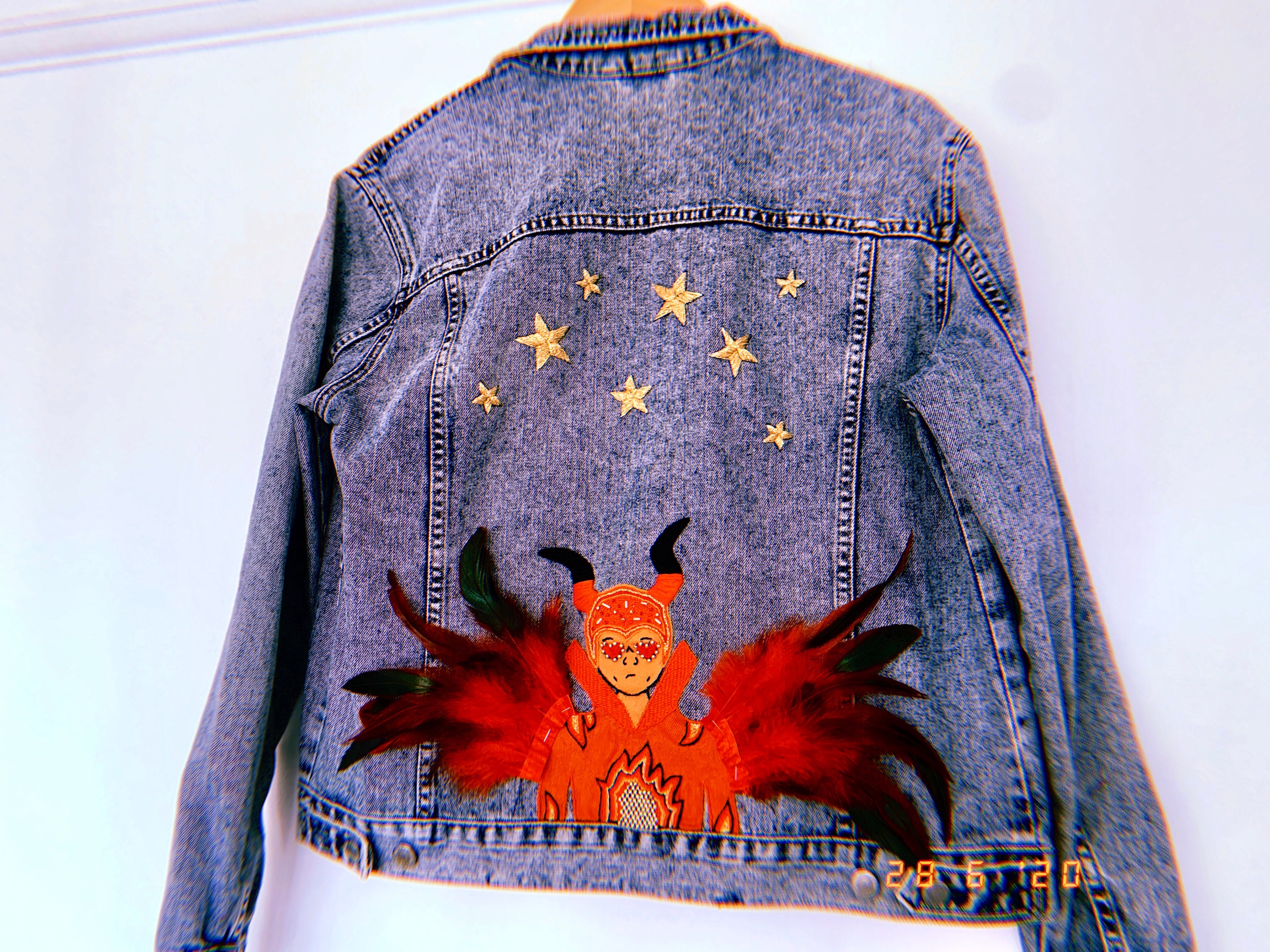 elton john jeans jacket