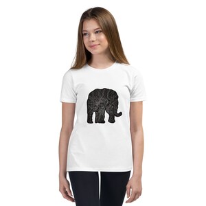 May include: White youth t-shirt with a black silhouette of an elephant with a geometric pattern inside.