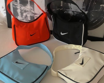 nike floral sling bag