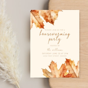 May include: Cream-colored housewarming party invitation with watercolor autumn leaves in shades of brown and orange. The text reads "Please join us for a housewarming party" hosted by the Williams, with date, time, and address.