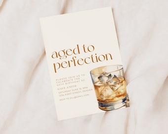 May include: A beige invitation card with brown text that reads "aged to perfection". The invitation is for a 50th birthday party for Dave Smith. The card features a watercolor illustration of a glass of whiskey with ice cubes.