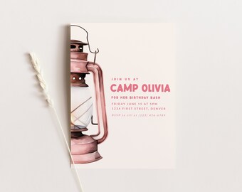 May include: A pink and brown lantern with a white background. The text "JOIN US AT CAMP OLIVIA FOR HER BIRTHDAY BASH FRIDAY JUNE 15 AT 5PM 1234 FIRST STREET, DENVER RSVP to Jill at (123) 456-6789" is printed on the invitation.