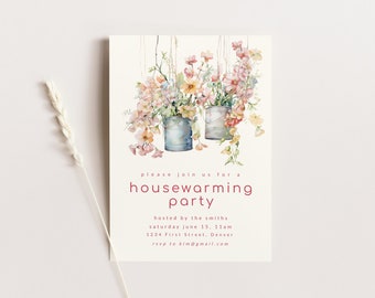 May include: A housewarming party invitation with a watercolor illustration of two metal cans with flowers hanging from them. The text reads "Please join us for a housewarming party hosted by the Smiths Saturday June 15, 11am 1234 First Street, Denver rsvp to kim@gmail.com"