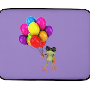 May include: A green frog wearing sunglasses holds a bunch of colorful balloons. The balloons are pink, purple, yellow, green, and blue. The frog is holding the balloons with its hands and is looking at the camera. The background is a light purple color.