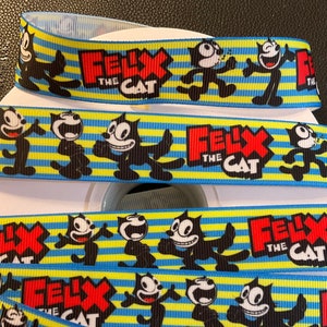 ¡EL FELINO! Cinta de 1 pulgada. Elige entre 3 y 5 yardas. El primer personaje animado es un gato divertido y travieso. ¡Es un regalo fantástico!