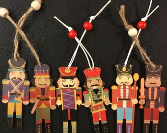 NUTCRACKERS!   Wooden nutcracker bachelors, choose your fave guy/all for gift tags/ornaments/rear view mirrors & they make a darn good gift!