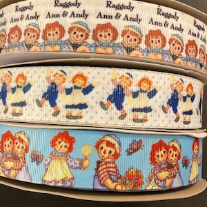 RAG DOLLS’ RIBBON!  1” grosgrain ribbon, 3 styles, choose 3/5 yds.  vintage style raggedy dolls of yesteryear & it makes a darn good gift!