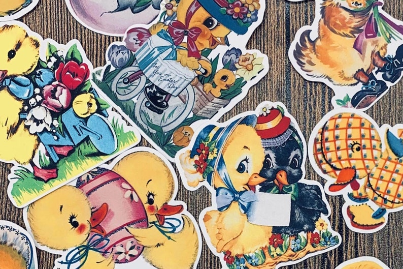 May include: A set of vintage Easter stickers featuring yellow chicks in various poses. Some chicks are holding flowers, riding a tricycle, or carrying an egg. Other stickers feature a black and white chick, a yellow chick with a plaid pattern, and a fluffy white kitten.