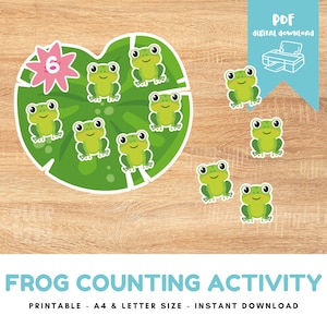 May include: Printable frog counting activity for children. The activity features a green lily pad with six frogs and a pink flower with the number 6. There are also six additional frogs to count and match.