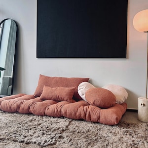 Corner floor pillow outlet