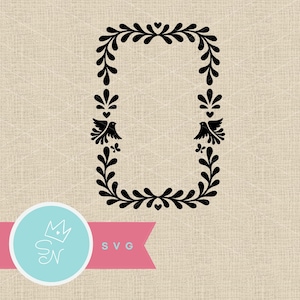 May include: A black rectangular frame design featuring symmetrical leafy branches, small hearts, and two birds facing inward. Below the frame is a pink banner with a light blue circle containing the letters SN, a crown icon, and the text SVG.