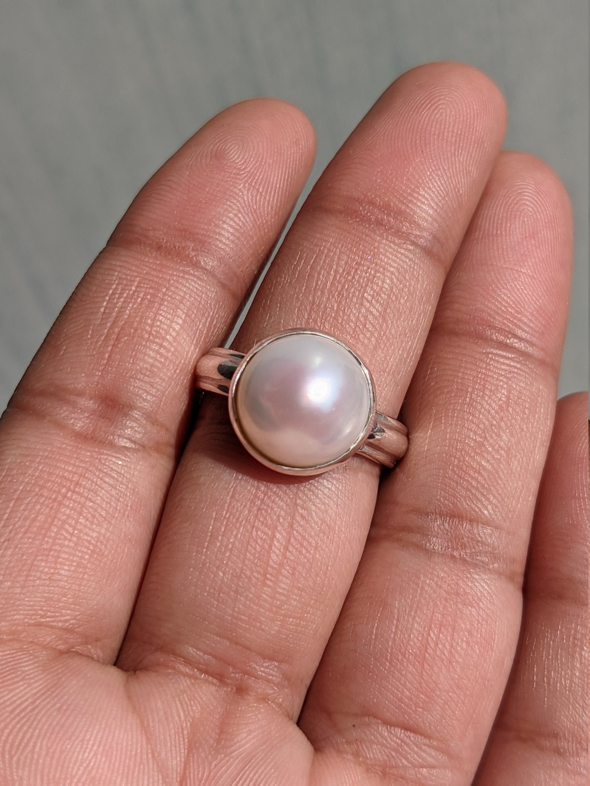 Sterling Silver Ring with 9.5-10mm Button Shape Freshwater Pearl and C –  Wing Wo Hing Jewelry Group - Pearl Jewelry Manufacturer