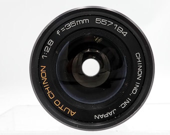 Obiettivo zoom Chinon 35 mm f/2.8 con attacco M42 - perfettamente funzionante.