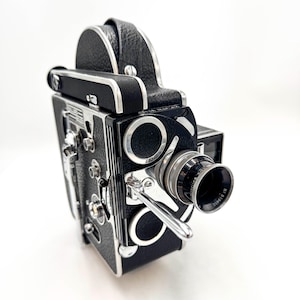 Paillard bolex h16 reflex 16mm cine film camera & 25mm f/1.5 rx lens
