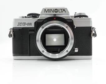 Minolta xg-m 35mm film slr camera - fully working
