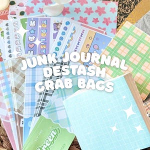 May include: A selection of colourful junk journal destash grab bags. The bags contain patterned papers, stickers, and small notebooks. The image includes text that reads "JUNK JOURNAL DESTASH GRAB BAGS" and "YOU ARE Green". The items are arranged in a woven basket.