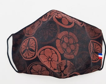 A reusable polycoton fabric mask with AFNOR standards with a Kamon Rouge motif