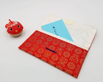 Pochette japonaise rouge motif manuscrit fait main avec fermoir traditionnel