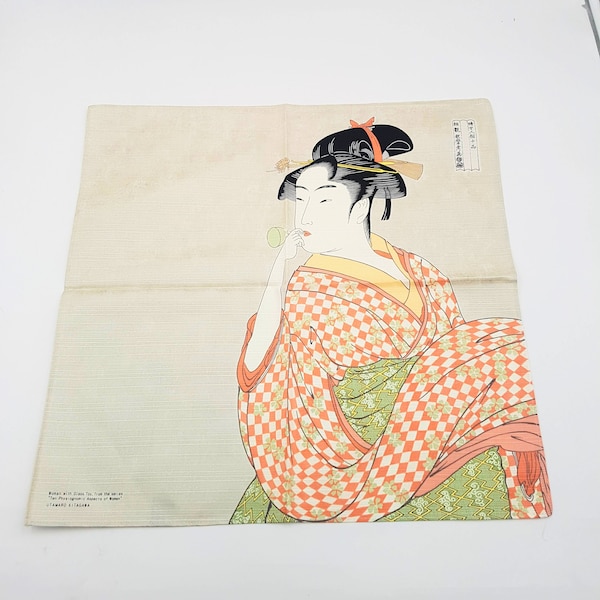 Furoshiki emballage cadeau en tissu réutilisable Motif une femme avec jouet en verre.