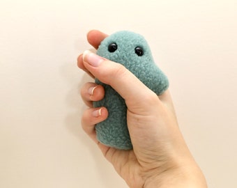 Anti-stress worry pet for left and right handed people