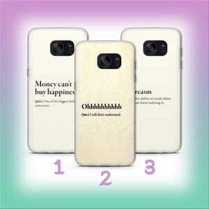 Puede incluir: Tres fundas para teléfono con citas humorísticas. La primera funda dice "Money can't buy happiness", la segunda "Ohhhhhhhhhh I still don't understand." La tercera dice "Sarcasm: The ability to insult idiots but them realising it."